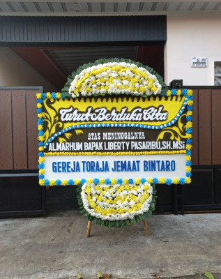 Papan Bunga Duka di Demen
