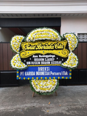 Papan Bunga Duka di Demen